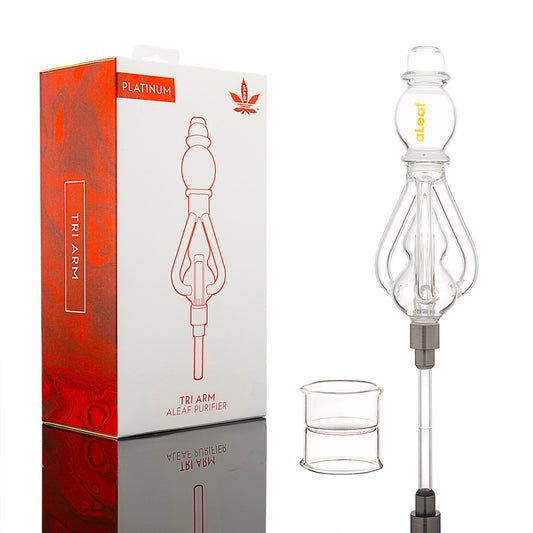 The Aleaf Nectar Collector Platinum with Tri Arm, a premium dabbing tool, is shown beside its red and white box. A small glass accessory is placed in front, ready to enhance your dabbing experience.