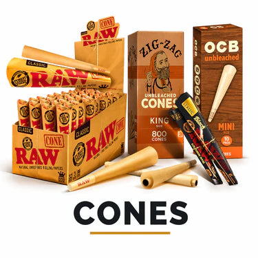 Display of various branded natural rolling paper cones including RAW, Zig-Zag, and OCB arranged neatly with some cones standing and others lying flat on a white background above the text "CONES".